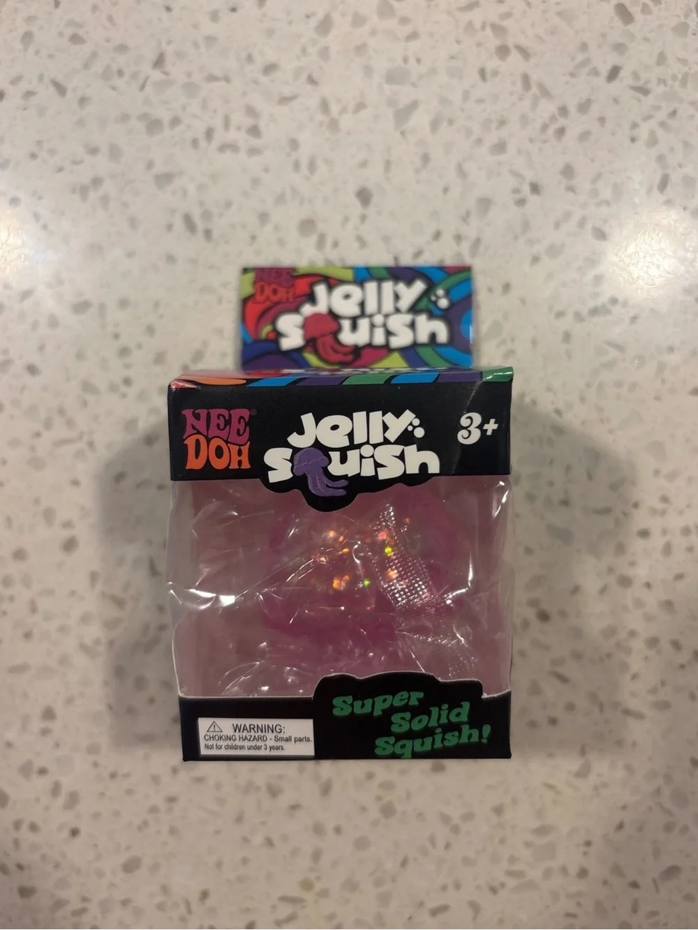 Nee Doh Jelly Squish Super Solid Squish - Pink Glitter